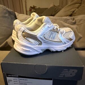 New Balance Kids' White and Gold Sneakers